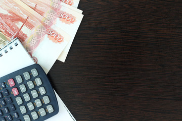 Russian money and a calculator as planning and budget concept