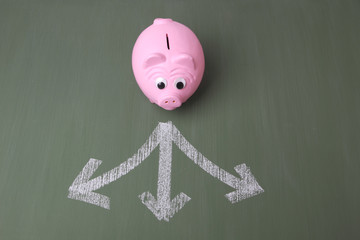 Pink piggy bank in front of three arrows showing different ways
