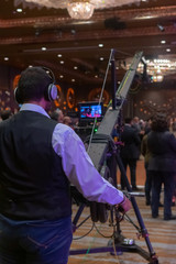Cameraman with a camera crane