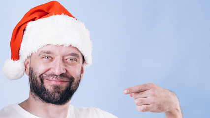 Christmas man pointing with finger at you