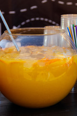 Large glass bowl with lemonade