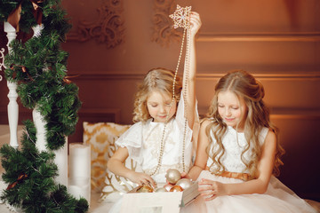 Two little angelic girls Christmas mood