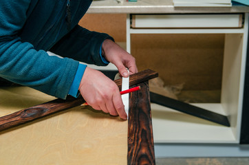 carpentry parts in the workshop, cutting corners for the manufacture of the product