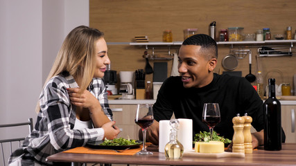 Couple making their conection even stronger while having a romantic dinner. Feeling loved.