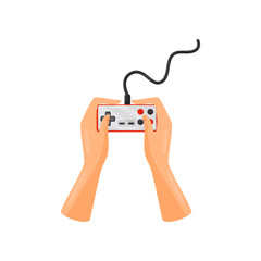 Hands holding wired controller remote, joystick, gaming concept vector Illustration on a white background © Happypictures
