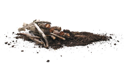 Soil, dirt pile with twigs, branches isolated on white background