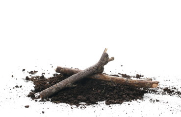 Soil, dirt pile with twigs, branches isolated on white background