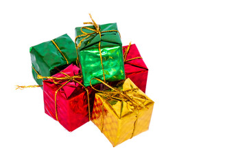 Pile of colorful gift boxes on white background