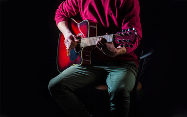 Guitar acoustic. Play the guitar. Live music. Music festival. Instrument on stage and band. Music concept. Electric guitar, string, guitarist, musician rock. Musical instrument. Guitars and strings.