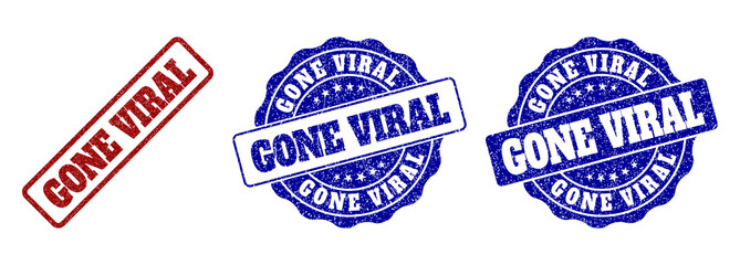 GONE VIRAL grunge stamp seals in red and blue colors. Vector GONE VIRAL watermarks with grunge effect. Graphic elements are rounded rectangles, rosettes, circles and text captions.