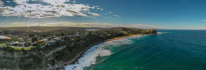 A panoramic view of waterfront homes gracing the cliffs of a northern beaches coastline in Sydney....