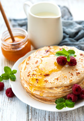Delicious pancakes with raspberries
