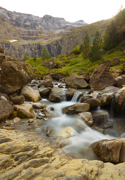 Mountain brook with flowing water, valley of Gavarnie, Pyrenees Occidentales, France