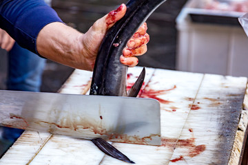 Fish cutting at the fish market