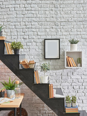 Black stairs detail at home, White brick wall background with frame and object book vase of flower.