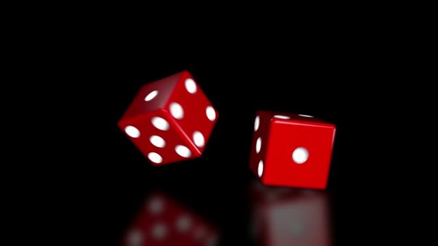 Red Dice Roll Over Black Glossy Reflective Background