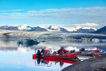 Boat Rides on Ice Lagoon, Iceland. Sunny frosty view of the fjord and ice icebergs