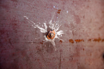 a bullet in the metal sheet, War actions aftermath, Ukraine and Donbass conflict