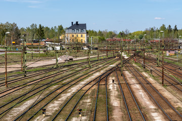 Over head view of railroad tracks splitting up at a railway station