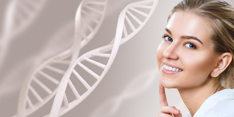 Portrait of sensual woman among DNA chains.