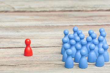 red against blue concept, crowd of pawns