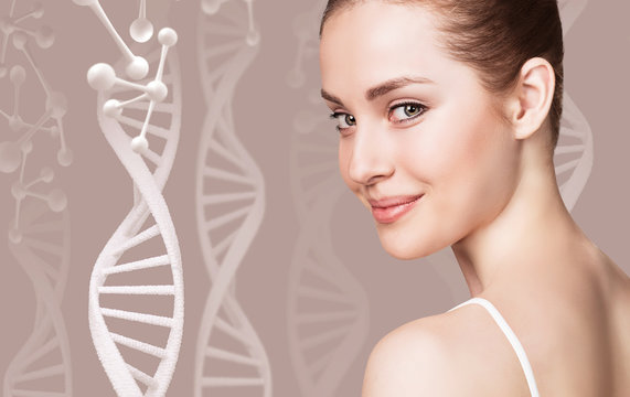 Portrait of sensual woman among DNA chains.