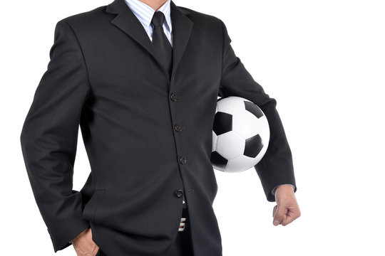 Business man and his leather ball.