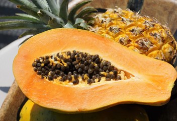 papaya and fruit on plate