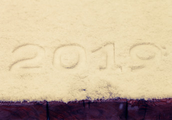 Figures 2019 on the snow. New year and christmas theme. Toned