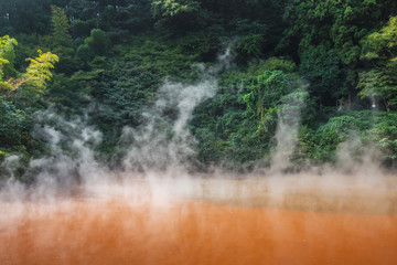 Fototapeta na wymiar Chinoike Jigoku, natural hot spring, the blood pond hell, Red water and hot