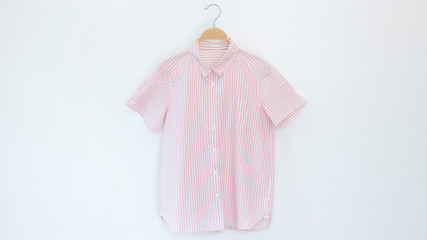 Woman blouse with Pink striped blouse cotton on white background.