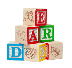 Wooden alphabet blocks isolated on white background