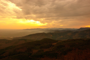 Mountains in the fog. Sunset time. Alsace (France)