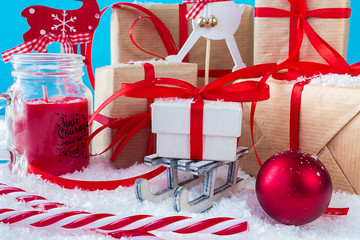 Christmas or New Year blue background with festive gift boxes. Holiday Christmas concept.
