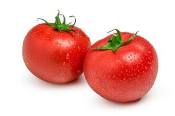Tomatoes isolated on white background. Two fresh raw vegetables