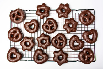 Homemade chocolate pretzels on a cooking grid