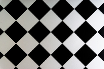 Chess board closeup background. Selective focus and crop fragment