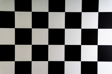 Chess board closeup background. Selective focus and crop fragment
