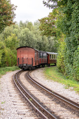 Fototapeta na wymiar Train de voyageurs à vapeur en gare, monument historique, Baie de Somme, Picardie, Hauts de France