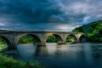 Fototapeta na wymiar evening shot of bridge over river tay in dunkeld in scotland