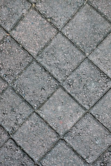 Gray concrete tile on the road background texture