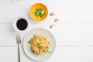 Noodles with bell pepper on plate