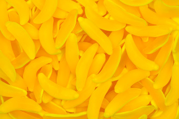 Yellow banana gummy candies. Top view. Jelly  sweets.