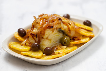 baked cod fish with potato, onion and olives