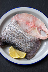 raw nile perch with lemon