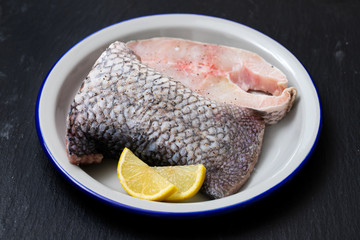 raw nile perch with lemon