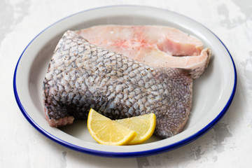 raw nile perch with lemon