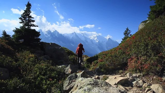 A man hiking on the famous Tour du Mont Blanc near Chamonix, France.