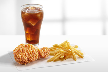 crispy coated batter southern style fried chicken in a wooden table