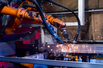 Welding robot, the process of welding a metal profile.